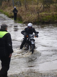 Motorbike crossing the ford at St John's Chapel